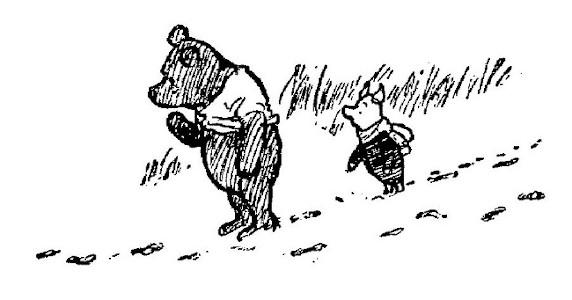 Here's a drawing of Pooh wondering, and Piglet pointing to black marks.