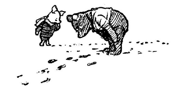 Now Pooh is bent over in the drawing, examining the tracks. Piglet is looking nervous.