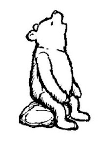 A drawing shows Pooh sitting on a stone, singing.